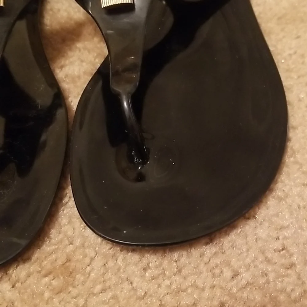 Michael Kors Black Jelly Thong Sandals with Gold Padlock Accent